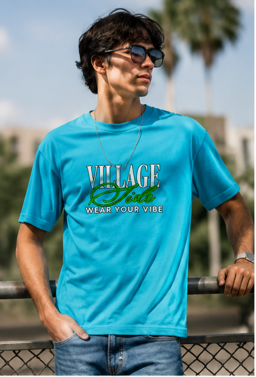 Model wearing village side blue t-shirt
